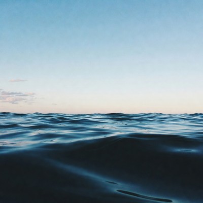 Ocean Waves Under Blue Sky