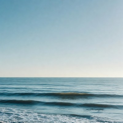 Ocean Waves Under Blue Sky