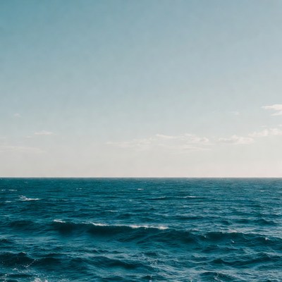Ocean Waves Under Blue Sky