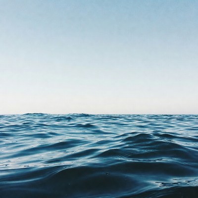 Ocean Waves Under Blue Sky