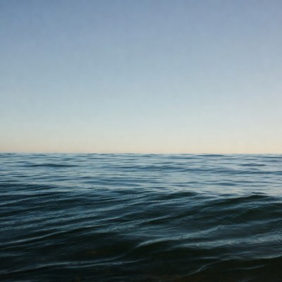 Ocean waves under blue sky