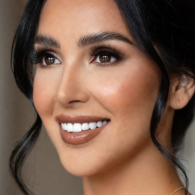 Smiling woman with glossy lips