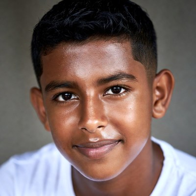 Smiling young South Asian boy