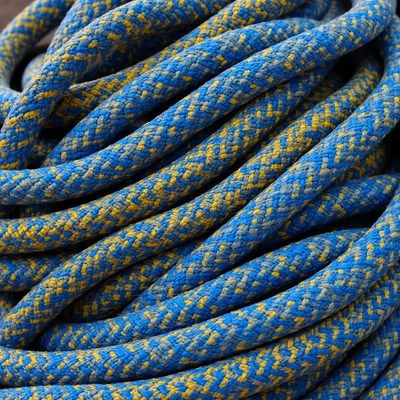 Coiled Blue Yellow Climbing Rope
