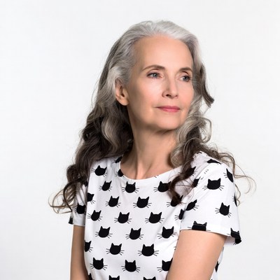 Woman with gray hair wearing cat t-shirt