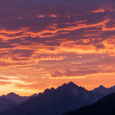 Sunset over Snowy Mountains