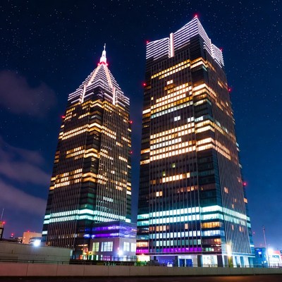 Illuminated Twin Skyscrapers at Night