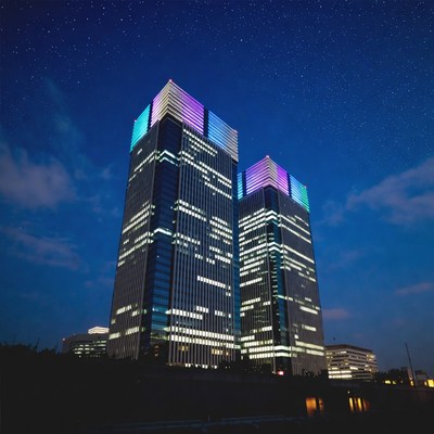 Twin Skyscrapers with Neon Lights at Night
