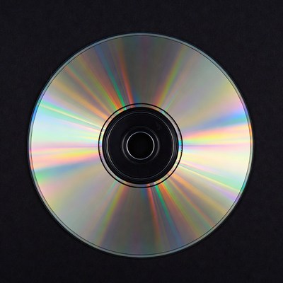 Shiny CD Disc on Black Background