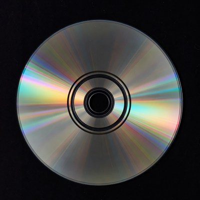 Shiny CD Disc on Black Background