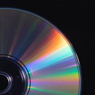 Shiny CD Disc on Black Background