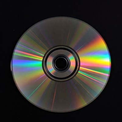 Shiny CD Disc on Black Background