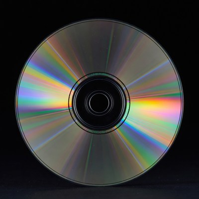 Shiny CD Disc on Black Background