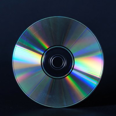 Shiny CD Disc on Black Background
