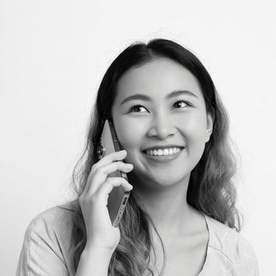 Asian woman talking on phone