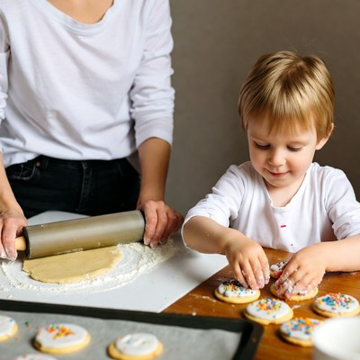 Mother and boy baking cookies