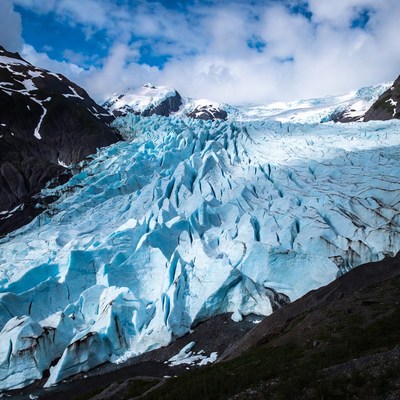 Massive Glacier in Snowy Mountains