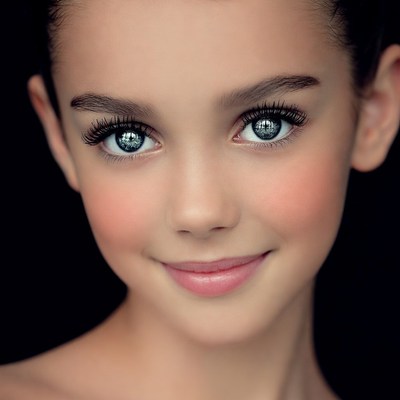Beautiful young girl smiling close-up