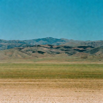 Green Valley and Distant Mountains
