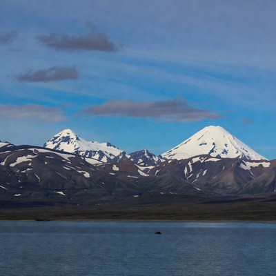 Snowy Mountains Reflecting in Lake