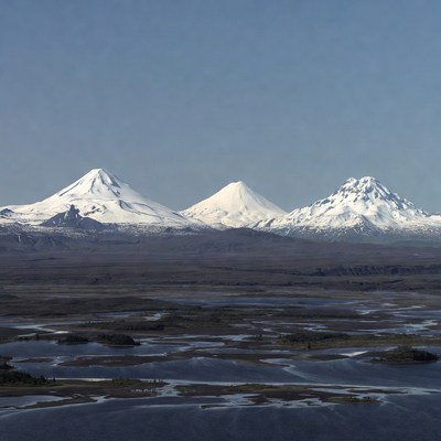 Three Snowy Volcanoes in Kamchatka