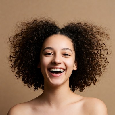 Smiling woman with curly hair