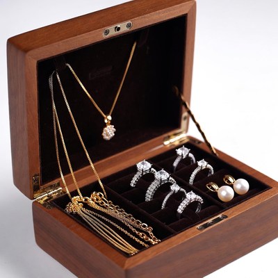 Open Wooden Jewelry Box with Necklaces and Rings