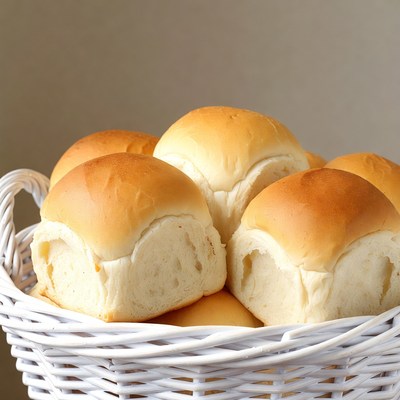 Fresh Dinner Rolls in White Basket