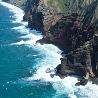 Ocean Waves Crashing Volcanic Cliffs