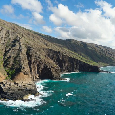 Ocean Cliffs with Turquoise Waves