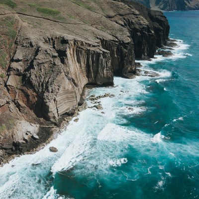 Dramatic Cliffs Over Turquoise Ocean