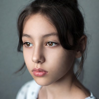 Asian girl with bun hairstyle