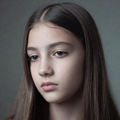 Teen girl with long brown hair