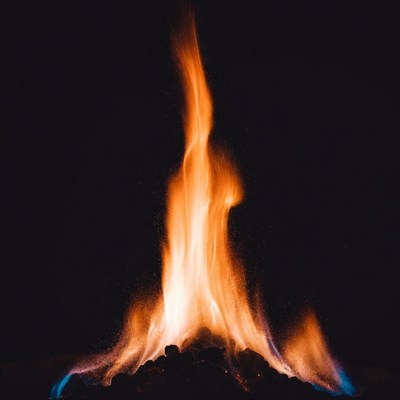 Bright orange flames on black background