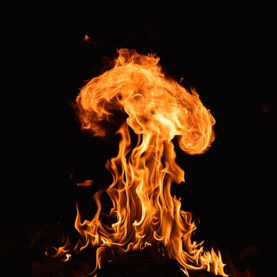 Fiery flame burst on black background