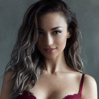 Beautiful woman in red lace bra