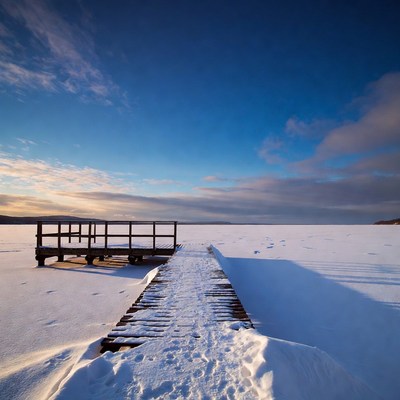 Wooden Pier on Frozen Lake