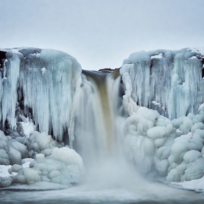 Frozen Waterfall in Icy Landscape
