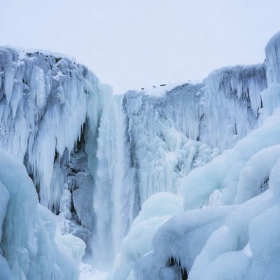 Frozen Waterfall in Icy Cliffs