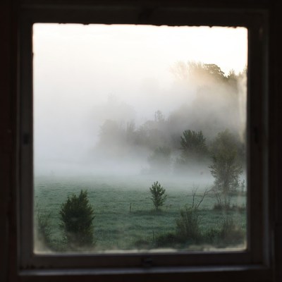 Misty Landscape Through Window