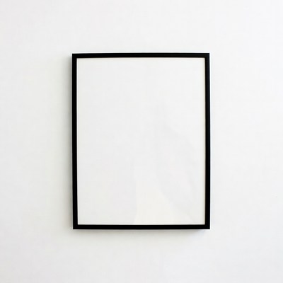 Empty black picture frame on white wall