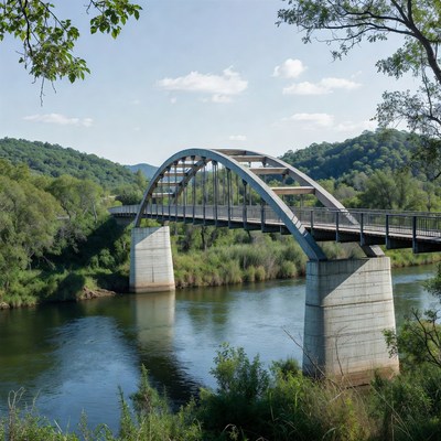 Steel arch bridge over river