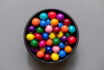 Colorful Candy in Black Bowl