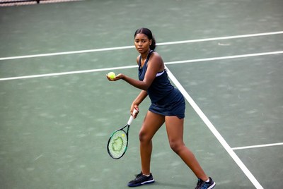 African-American woman playing tennis