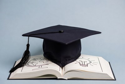 Graduation Cap on Open Book