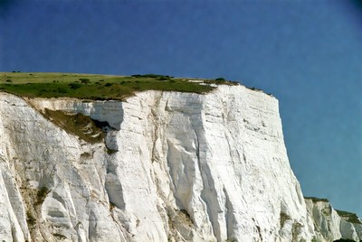 White Cliffs with Green Top and Blue Sky