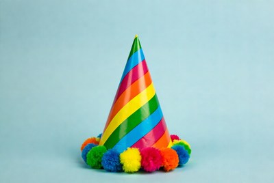 Rainbow Party Hat with Pom Poms