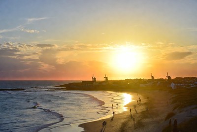 Windmills on Beach at Sunset