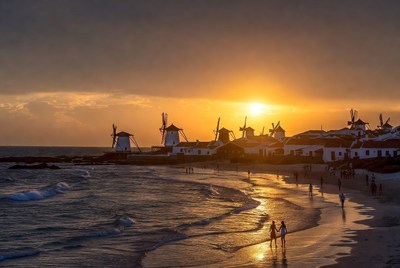 Windmills at Sunset Beach with Couple