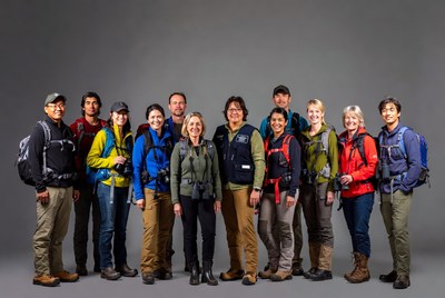Diverse hiking group with binoculars